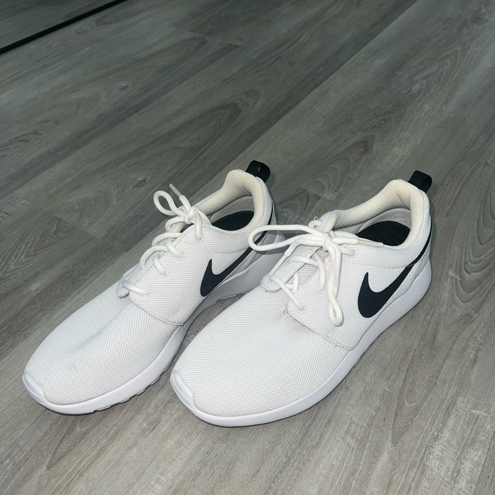 Nike White Athletic Shoes with Black Logo